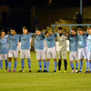 Players observe a minute's silence