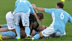 Alex Gudger is mobbed after scoring the winning goal - Beaconsfield 1-2 Rugby Town - October 2014