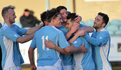 Players celebrate Richard Gregory's opening goal - Rugby Town FC